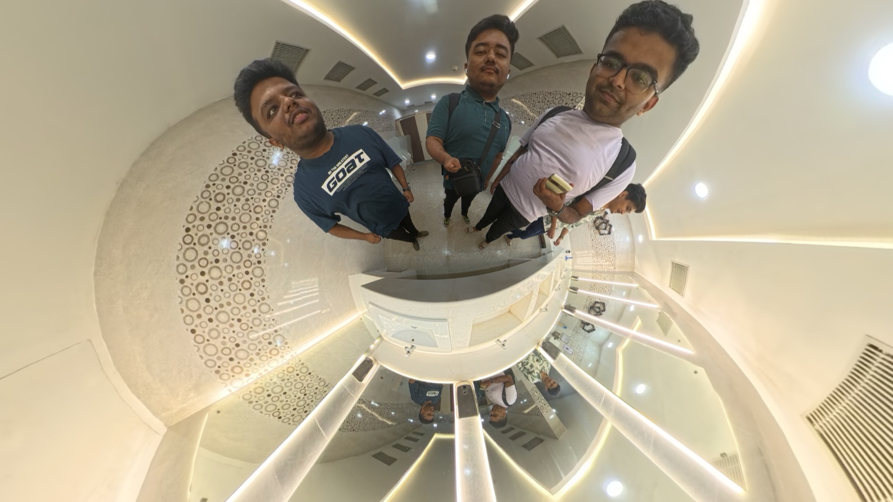 The three NwRade founders in a 360° fisheye selfie.
